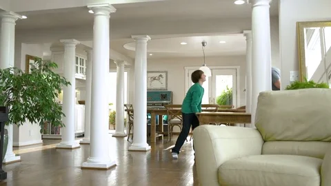 Father and son moving a table Stock Footage 76532073