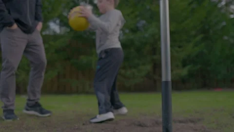 Father And Son Play Tetherball Together Stock Footage 208782242