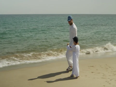 Father and son playing at beach. Stock Footage 69405880