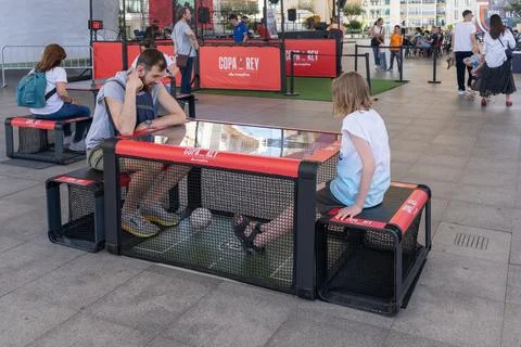 Father and son playing interactive football Fotos Stock