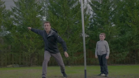 Father And Son Playing Tetherball Stock Footage 208782057