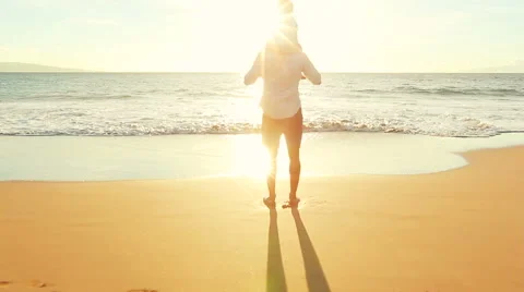 Father and Son Playing Together at the Beach at Sunset. Stock-Footage 56531355