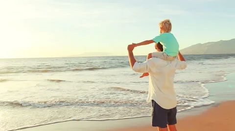 Father and Son Playing Together at the Beach at Sunset. 스톡 동영상 56531449