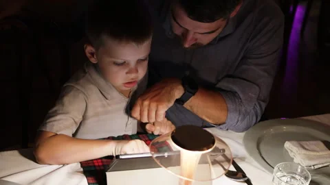 Father and son playing virtual game. Stock Footage 276204254