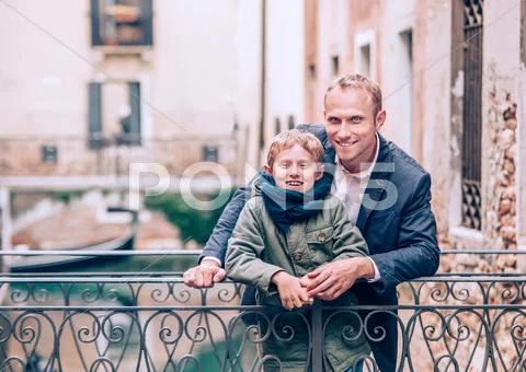 Father and son portrait on the Venetian bridge Stock Photos
