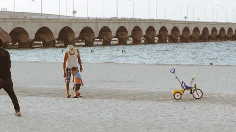 FATHER AND SON PUERTO PROGRESO LIFE IN MERIDA YUCATAN MEXICO. PROGRESO Video stock 100793030