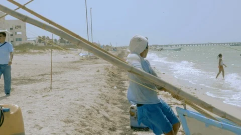 FATHER AND SON PUERTO PROGRESO LIFE IN MERIDA YUCATAN MEXICO PROGRESO Video stock 121079787