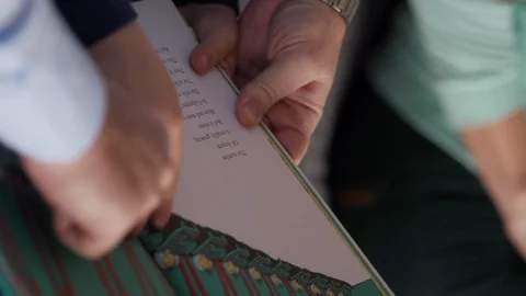 Father and son reading a book close up Stock Footage 91823583