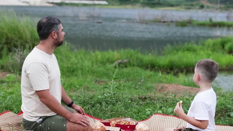 Father and son share a joyful moment. Video stock 288980282