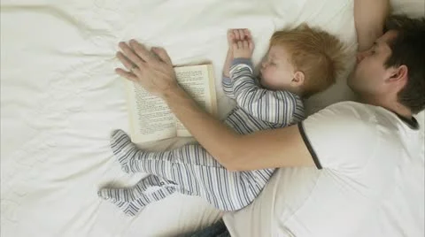 Father and son sleeping Stock Footage 11283751