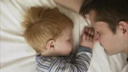 Father And Son Sleeping, Sweden. Stock Footage