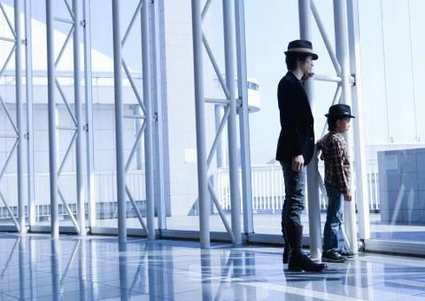 Father and son standing Stock Photos
