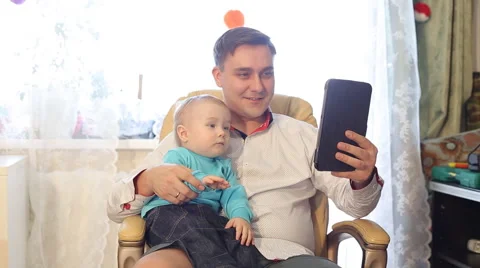 Father And Son Use The Tablet Stock Footage 61750384