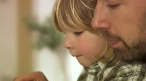 Father and son using a laptop, Stockholm Stock Footage 11298538