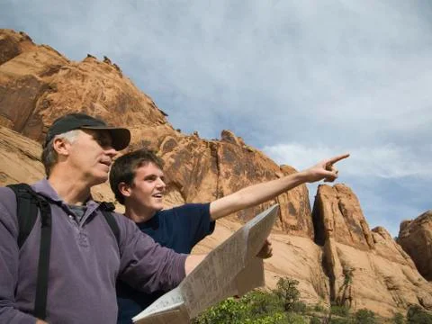 Father and son using map 스톡 사진