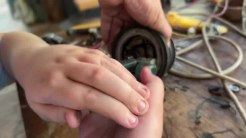 Father and son using tools work. Fixing the engine together. Stock Footage 282356879