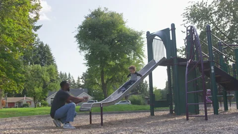 Father Catches His Son at the Bottom of | Stock Video | Pond5