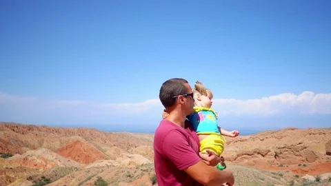 Father with child in the mountains Stock Footage 101679375