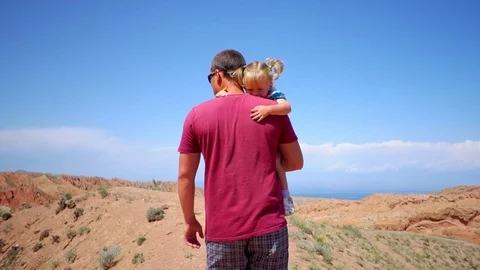 Father with child in the mountains Stock Footage 105398532