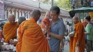 Father With Child Prays With Monk On Street,Bangkok,Thailand Stock Footage