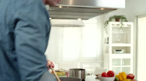 Father with children preparing pizza at kitchen. Stock Footage 64106830