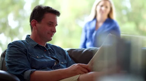 Father with children using digital tablet at home. Stock Footage 64109808