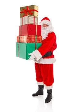 Father Christmas holding a stack of presents, isolated on white Stock Photos