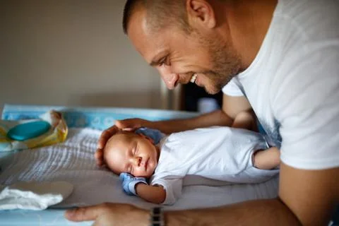 Father cuddle son Stock Photos