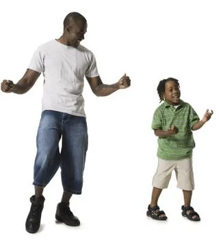 Father dancing with young son Stock Photos