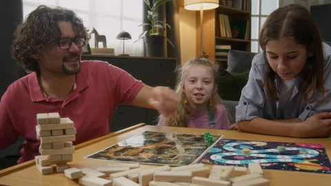 Father with Disability Playing Roll and Move Game with Kids at Home Stock Footage 307346113