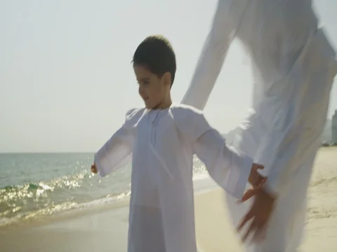 Father embracing son at the beach. Stock Footage 69415447