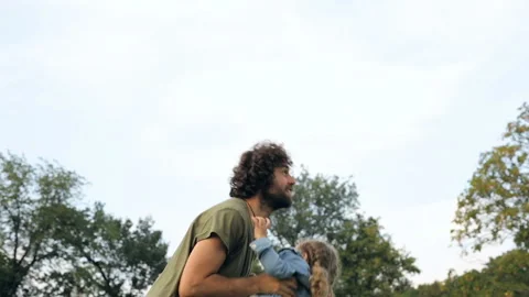 Father having fun and playing with his daughter. Stock Footage 95284030