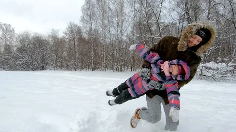 Father having fun with his child in winter park Stock Footage 101387652