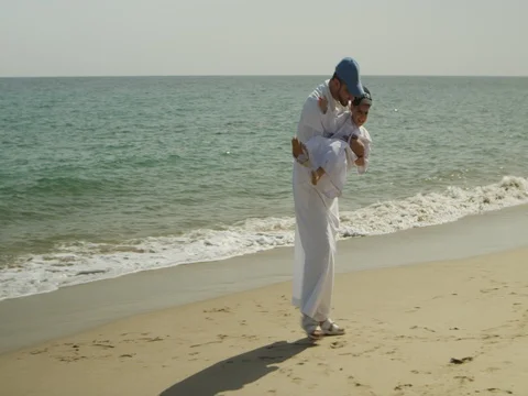 Father having fun with son at beach. Stock Footage 69406256
