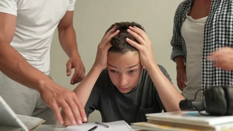 Father helping his son with schoolwork. Young little shoolboy solving Stock Footage 196828645