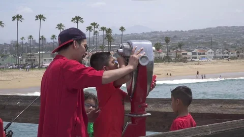 Father Helping Sons View Observation Deck Binocular viewer in observation deck Stock Footage 113298210