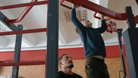 Father helps son catch up Stock Footage 104858193