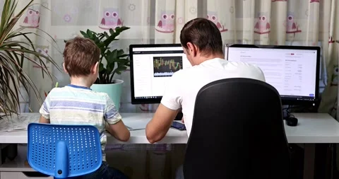 Father with kid trying to work from home during quarantine. Stock Footage 168940806