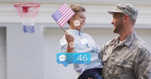 Father lifting son while waving flags sharing pride as comment-count graphics Stock Footage 313294653