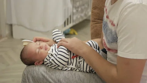 Father with newborn son Stock Footage 98664065