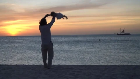 Father playing and dancing with his toddler daughter in Caribbean beach on Stock Footage 240204283