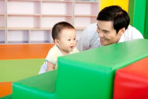 Father Playing With Son Stock-Fotos