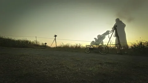 Father pushing son in stroller sunset timelapse Stock Footage 218031011