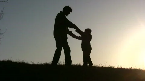 Father rotate son sunset Stock Footage 121056