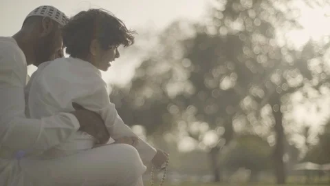 Father sitting with son. Video stock 105782736