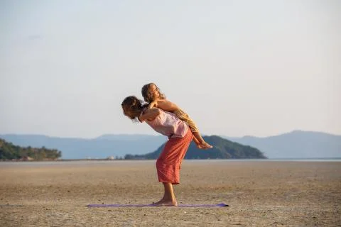 Father with son on the beach Stock Photos