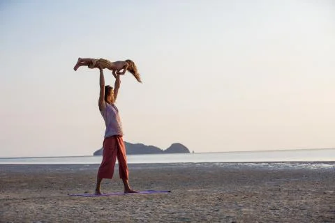Father with son on the beach Stock Photos