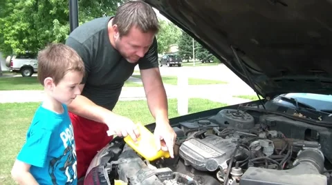 Father &amp; Son Looking Under Hood of Car 動画素材 65745948