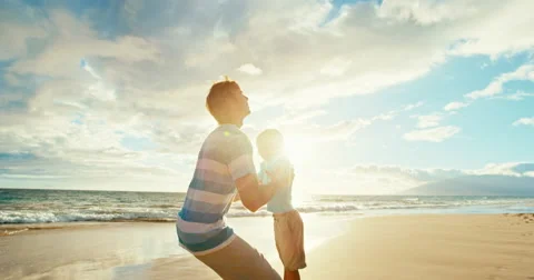 Father Son Playing at the Beach Stock Footage 66073120