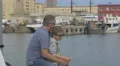 Father with son relaxing in the port of Barcelona 4k or 4k+ Resolution